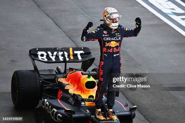 Race winner and 2022 F1 World Drivers Champion Max Verstappen of Netherlands and Oracle Red Bull Racing celebrates in parc ferme during the F1 Grand...