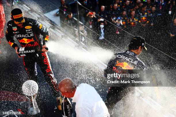 Race winner and 2022 F1 World Drivers Champion Max Verstappen of Netherlands and Oracle Red Bull Racing and Second placed Sergio Perez of Mexico and...