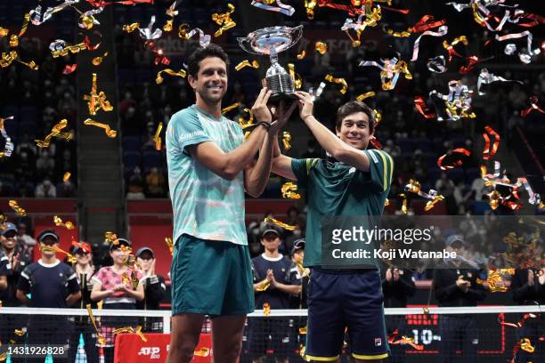 Mackenzie McDonald of the United States and Marcelo Melo of Brazil celebrate victory against Rafael Matos of Brazil and David Vega Hernandez of Spain...