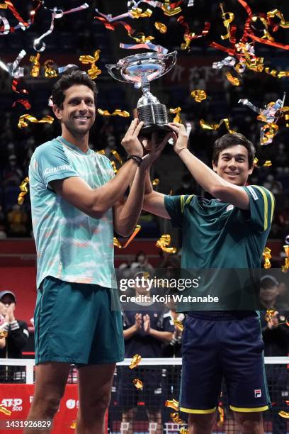 Mackenzie McDonald of the United States and Marcelo Melo of Brazil celebrate victory against Rafael Matos of Brazil and David Vega Hernandez of Spain...