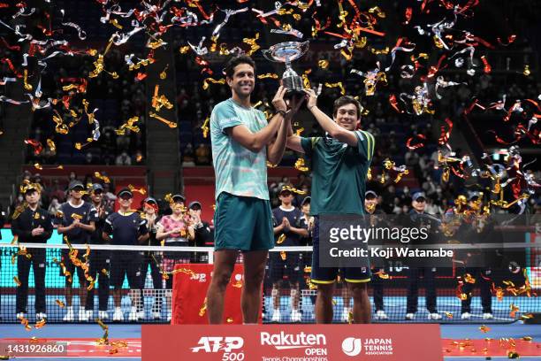 Mackenzie McDonald of the United States and Marcelo Melo of Brazil celebrate victory against Rafael Matos of Brazil and David Vega Hernandez of Spain...