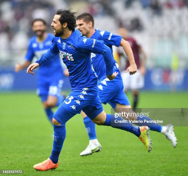 Mattia Destro of Empoli FC celebrates scoring their side's first goal during the Serie A match between Torino FC and Empoli FC at Stadio Olimpico di...