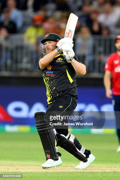 Aaron Finch of Australia plays a shot down the ground for four during game one of the T20 International series between Australia and England at Optus...