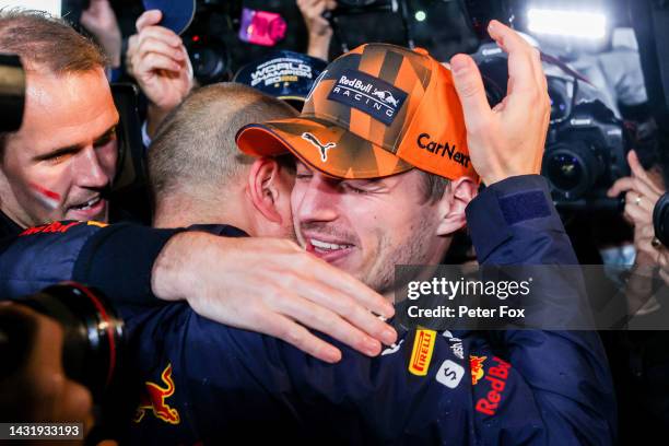 Max Verstappen of Red Bull Racing and The Netherlands celebrates becoming Formula One Drivers World Champion with his Race Engineer Gianpiero...