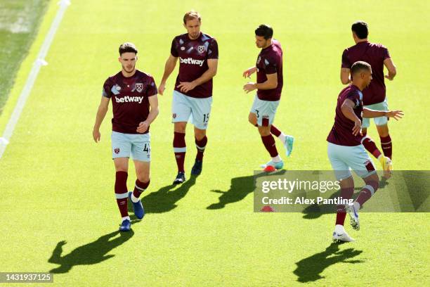 Declan Rice of West Ham United warms up prior to the Premier League match between West Ham United and Fulham FC at London Stadium on October 09, 2022...