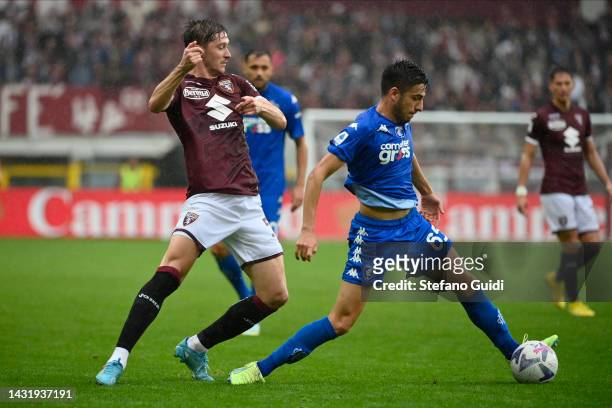 Aleksej Mirancuk of Torino FC against Fabiano Parisi of Empoli FC during the Serie A match between Torino FC and Empoli FC at Stadio Olimpico di...