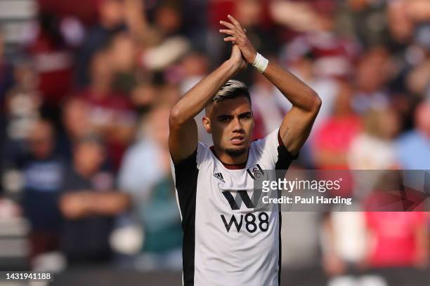 Andreas Pereira of Fulham celebrates after scoring their team's first goal during the Premier League match between West Ham United and Fulham FC at...