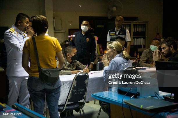 Journalists, Anna Coren and Daniel Hodge, speak to police after being detained for entering the crime scene of a mass shooting at a daycare center on...