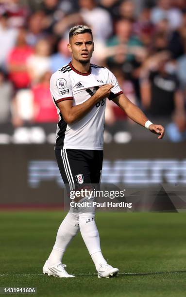 Andreas Pereira of Fulham celebrates after scoring their team's first goal during the Premier League match between West Ham United and Fulham FC at...