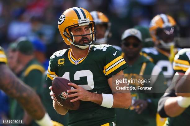 Aaron Rodgers of the Green Bay Packers warms up prior to the NFL match between New York Giants and Green Bay Packers at Tottenham Hotspur Stadium on...