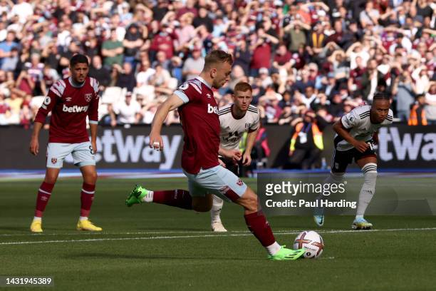 Jarrod Bowen of West Ham United scores their team's first goal from the penalty spot during the Premier League match between West Ham United and...