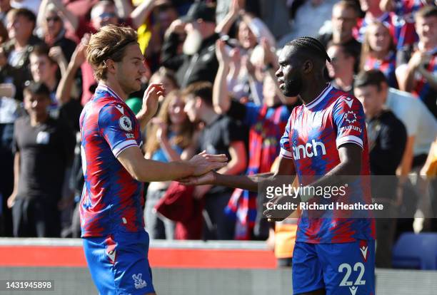 Odsonne Edouard of Crystal Palace celebrates scoring their side's first goal with teammate Joachim Andersen during the Premier League match between...
