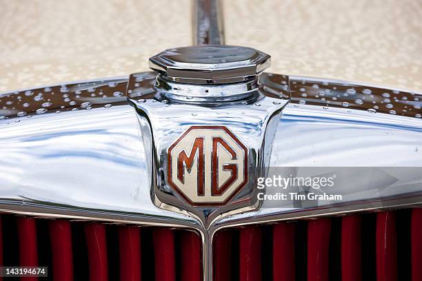 Badge Logo of MG car at classic car rally at Brize Norton in Oxfordshire, UK
