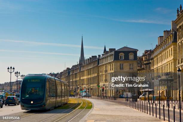 Public transport tram system runs in old Bordeaux, France.