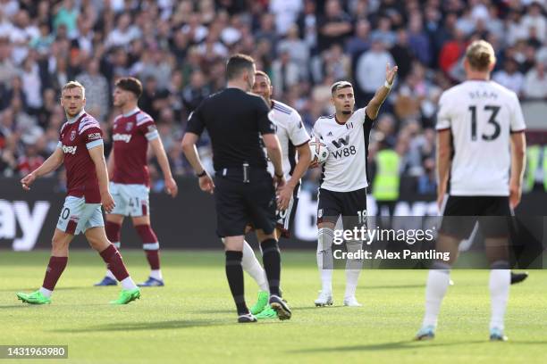 Andreas Pereira of Fulham reacts after Gianluca Scamacca of West Ham United scored their sides second goal during the Premier League match between...