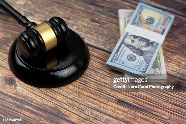 gavel and money - human settlement fotografías e imágenes de stock