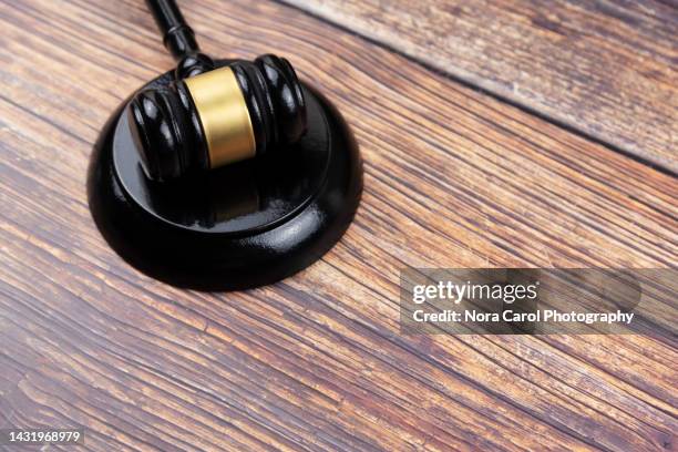 black gavel on wood background with copy space - judges table stock pictures, royalty-free photos & images