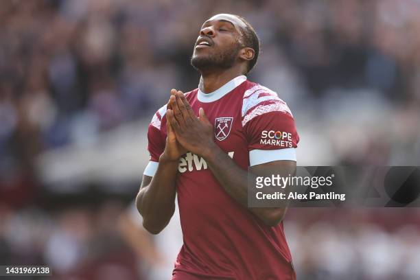 Michail Antonio of West Ham United celebrates after scoring their team's third goal during the Premier League match between West Ham United and...