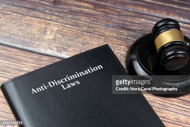 anti discrimination law book and gavel - 性差別 ストックフォトと画像