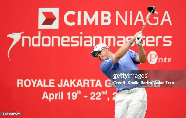 Lee Westwood of England plays a shot during day three of the CIMB Niaga Indonesian Masters presented by PNTS at Royale Jakarta Golf Course on April...