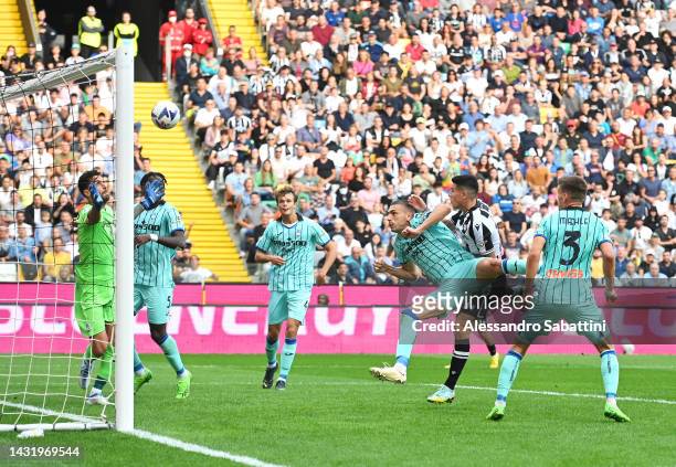 Nehuen Perez of Udinese Calcio scores their side's second goal during the Serie A match between Udinese Calcio and Atalanta BC at Dacia Arena on...