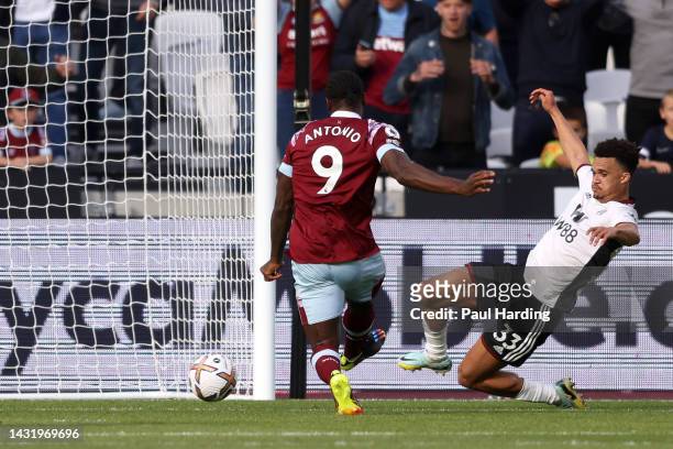 Michail Antonio of West Ham United scores their team's third goal during the Premier League match between West Ham United and Fulham FC at London...