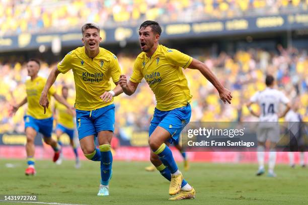 Victor Chust of Cadiz CF celebrates scoring their side's first goal with teammates during the LaLiga Santander match between Cadiz CF and RCD...