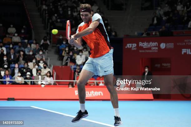 Taylor Fritz of the United States hits a return shot against Frances Tiafoe of the United States during the singles final game on day seven of the...