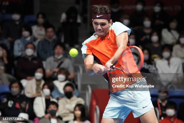 Taylor Fritz of the United States hits a return shot against Frances Tiafoe of the United States during the singles final game on day seven of the...