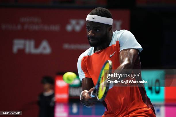 Frances Tiafoe of the United States hits a return shot against Taylor Fritz of the United States during the singles final game on day seven of the...