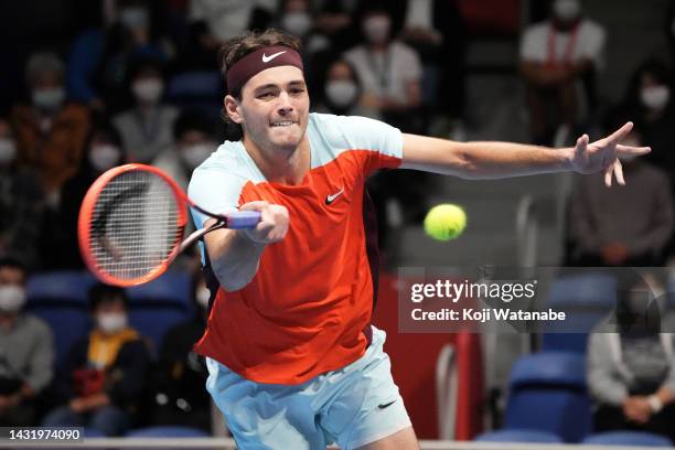 Taylor Fritz of the United States hits a return shot against Frances Tiafoe of the United States during the singles final game on day seven of the...