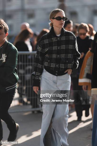 Pernille Teisbaek seen wearing a long jeans skirt and a patterned jacket, outside Chanel during Paris Fashion Week on October 04, 2022 in Paris,...