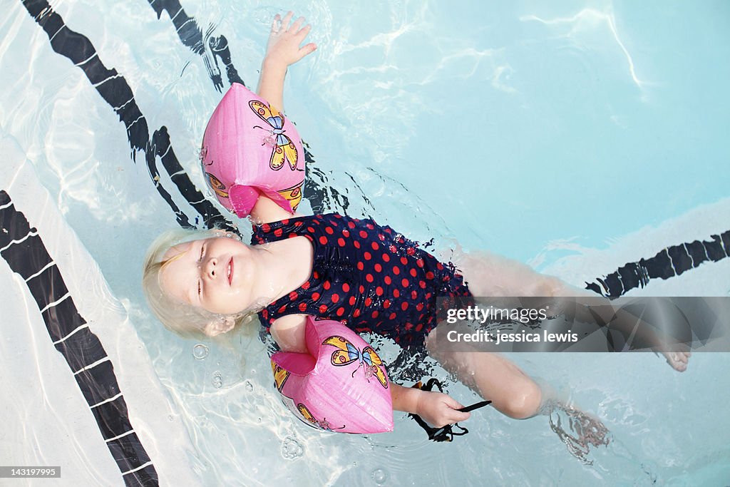 Tween Floating Inpool Girl Floating In Pool High-Res Stock Photo - Getty Images