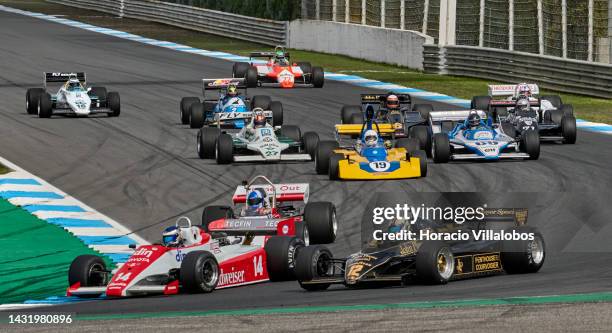 Formula 1 cars speed by during the Classic GP Pre-1986 F1 race on the last day of Estoril Classics in Fernanda Pires da Silva Estoril Circuit on...