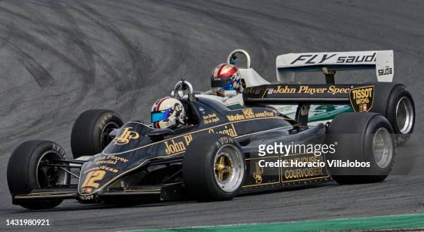 Formula 1 Lotus and Williams cars speed by during the Classic GP Pre-1986 F1 race on the last day of Estoril Classics in Fernanda Pires da Silva...