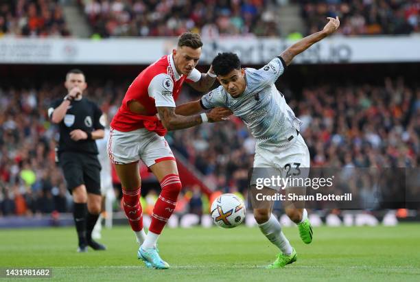 Luis Diaz of Liverpool is challenged by Ben White of Arsenal during the Premier League match between Arsenal FC and Liverpool FC at Emirates Stadium...