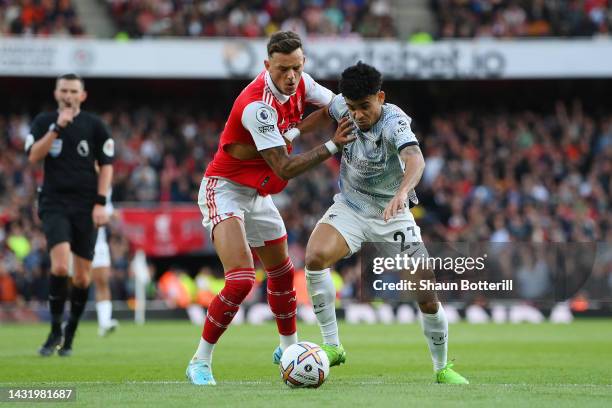 Luis Diaz of Liverpool is challenged by Ben White of Arsenal during the Premier League match between Arsenal FC and Liverpool FC at Emirates Stadium...