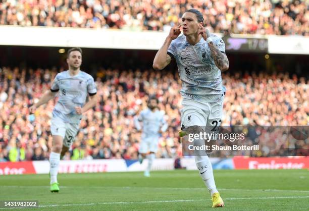 Darwin Nunez of Liverpool celebrates after scoring their team's first goal during the Premier League match between Arsenal FC and Liverpool FC at...