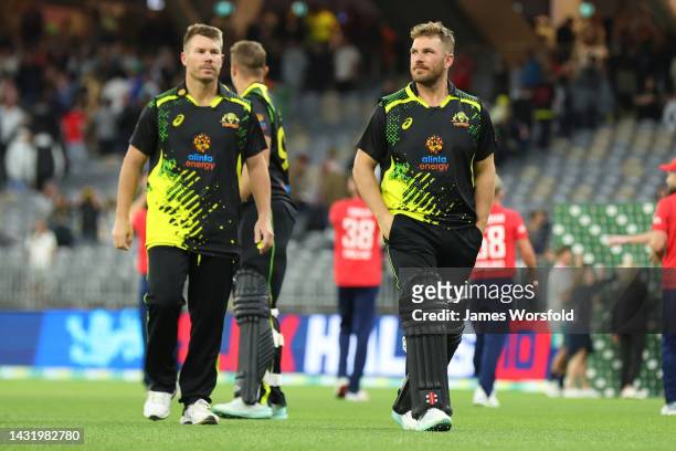 Aaron Finch of Australia walks off the field after the loss during game one of the T20 International series between Australia and England at Optus...