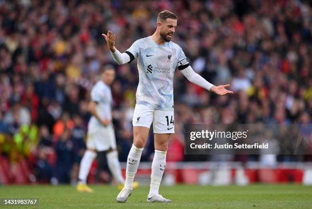 Jordan Henderson of Liverpool reacts after Bukayo Saka of Arsenal scored their sides second goal during the Premier League match between Arsenal FC...