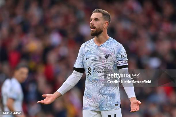 Jordan Henderson of Liverpool reacts after Bukayo Saka of Arsenal scored their sides second goal during the Premier League match between Arsenal FC...