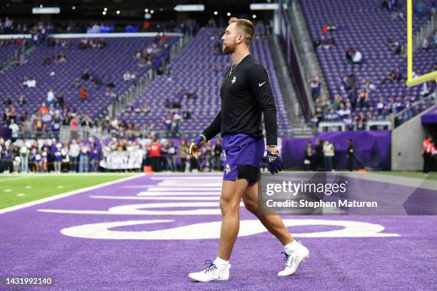 Adam Thielen of the Minnesota Vikings warms up before the game against the Chicago Bears at U.S. Bank Stadium on October 09, 2022 in Minneapolis,...