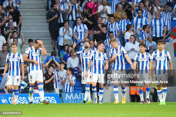 Brais Mendez of Real Sociedad celebrates with teammates after scoring their team's first goal during the LaLiga Santander match between Real Sociedad...