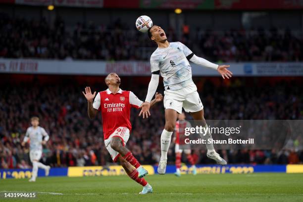 Virgil van Dijk of Liverpool jumps for the ball with Gabriel Jesus of Arsenal during the Premier League match between Arsenal FC and Liverpool FC at...