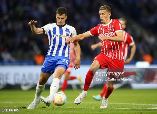 Marc-Oliver Kempf of Hertha BSC is challenged by Nils Petersen of SC Freiburg during the Bundesliga match between Hertha BSC and Sport-Club Freiburg...