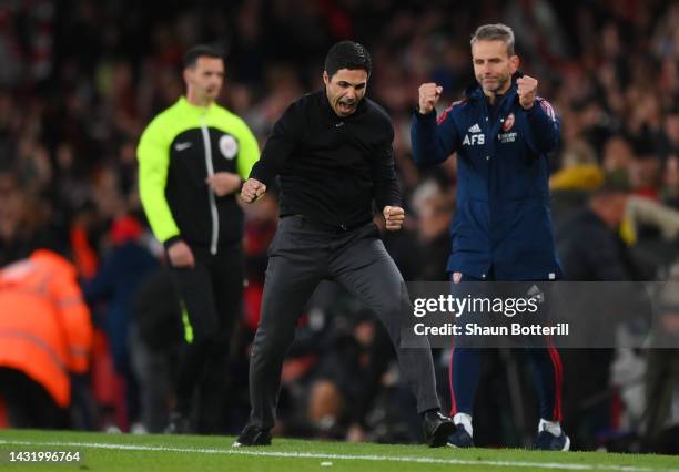 Mikel Arteta, Manager of Arsenal celebrates after their sides victory during the Premier League match between Arsenal FC and Liverpool FC at Emirates...