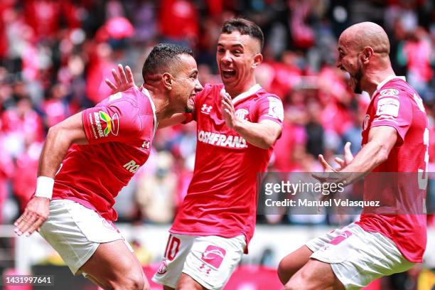 Camilo Da Silva of Toluca celebrates with his teammates after scoring his team's first goal during the playoff match between Toluca and FC Juarez as...