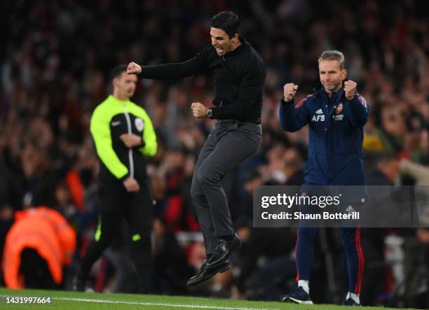 Mikel Arteta, Manager of Arsenal celebrates after their sides victory during the Premier League match between Arsenal FC and Liverpool FC at Emirates...