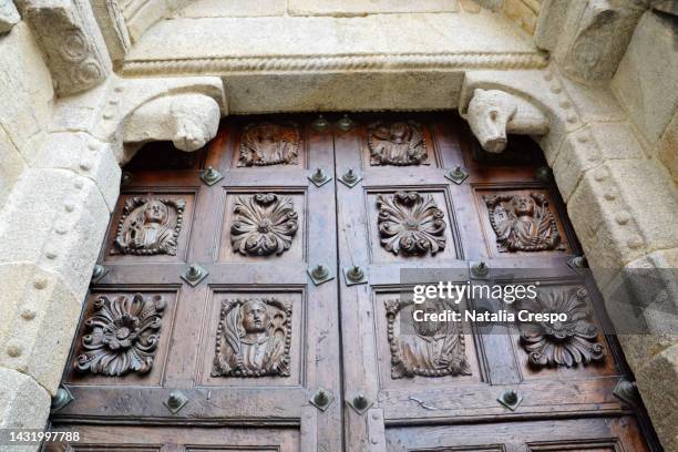 gate of the cathedral of tui. pontevedra. - relief carving stock pictures, royalty-free photos & images