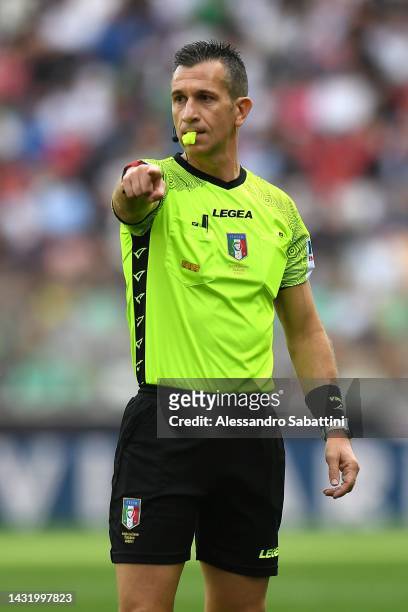 Referee Daniele Doveri gestures during the Serie A match between Udinese Calcio and Atalanta BC at Dacia Arena on October 09, 2022 in Udine, Italy.